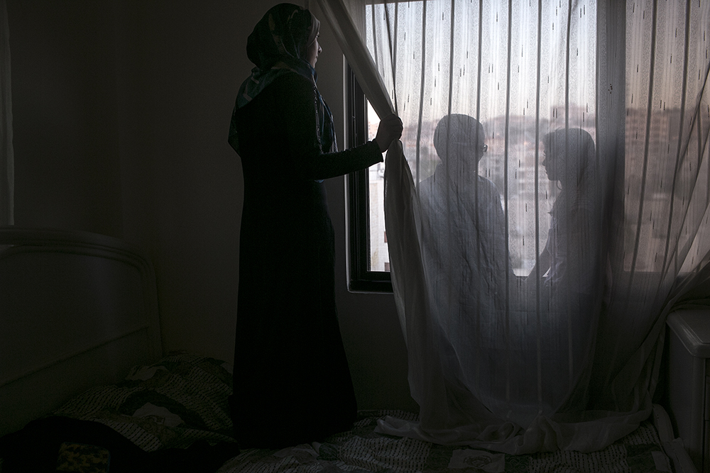 Jordan. Syrian refugee and female headed house hold survivor of SGVB struggles for her children sake.